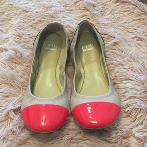 Never worn saks flats with snakeskin